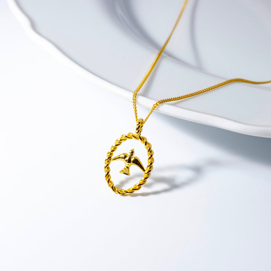 'Maureen' gold curb chain with 925 sterling silver bird charm