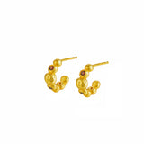 EDENAI Gold earrings with round elements, garnet stone