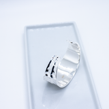 LORNA Solid bangle with uneven surface, 30 mm wide