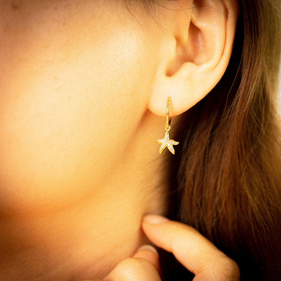 'Warri' silver hoop earrings with starfish pendant made of 925 sterling silver