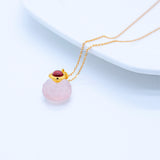 Collier en or MONIQUE avec pendentif bouteille de parfum en quartz rose en argent 925