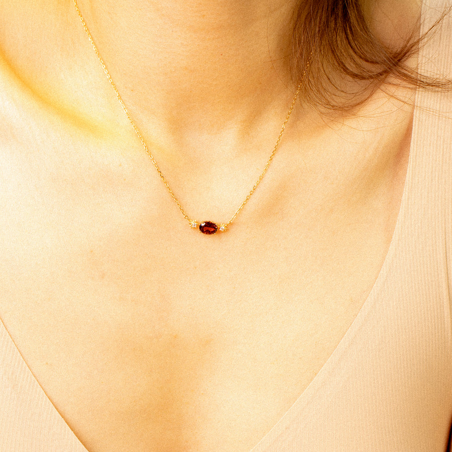 'Unguana' gold necklace with garnet stone pendant made of 925 sterling silver