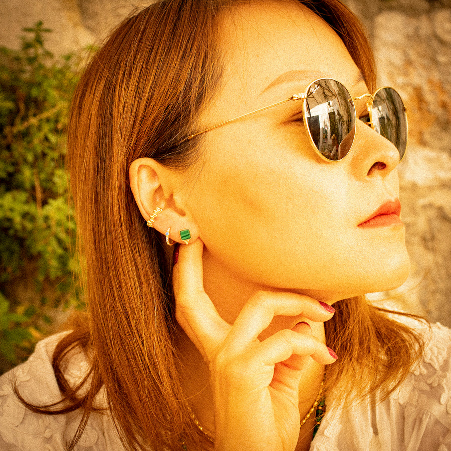 'Koes' gold hoop earrings with stone embellishment made of 925 sterling silver