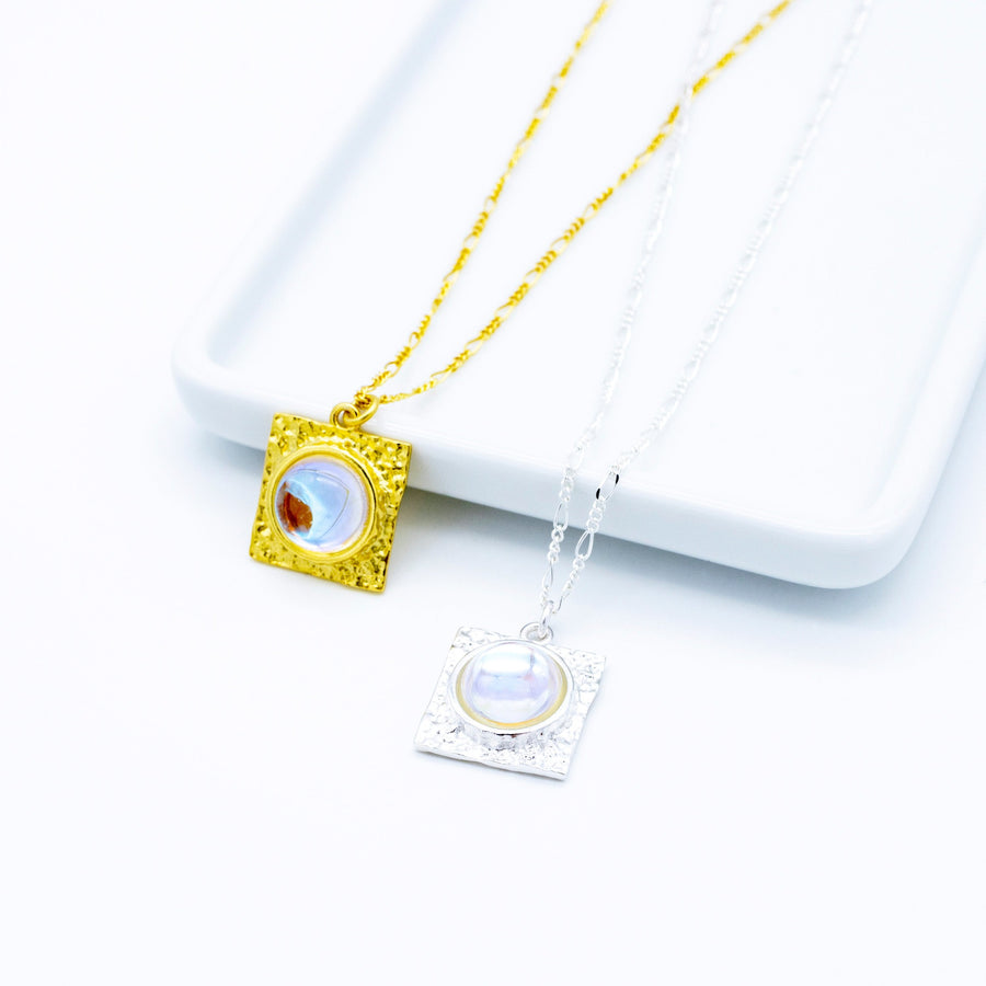 'Olla' gold necklace with a square pendant in sterling silver