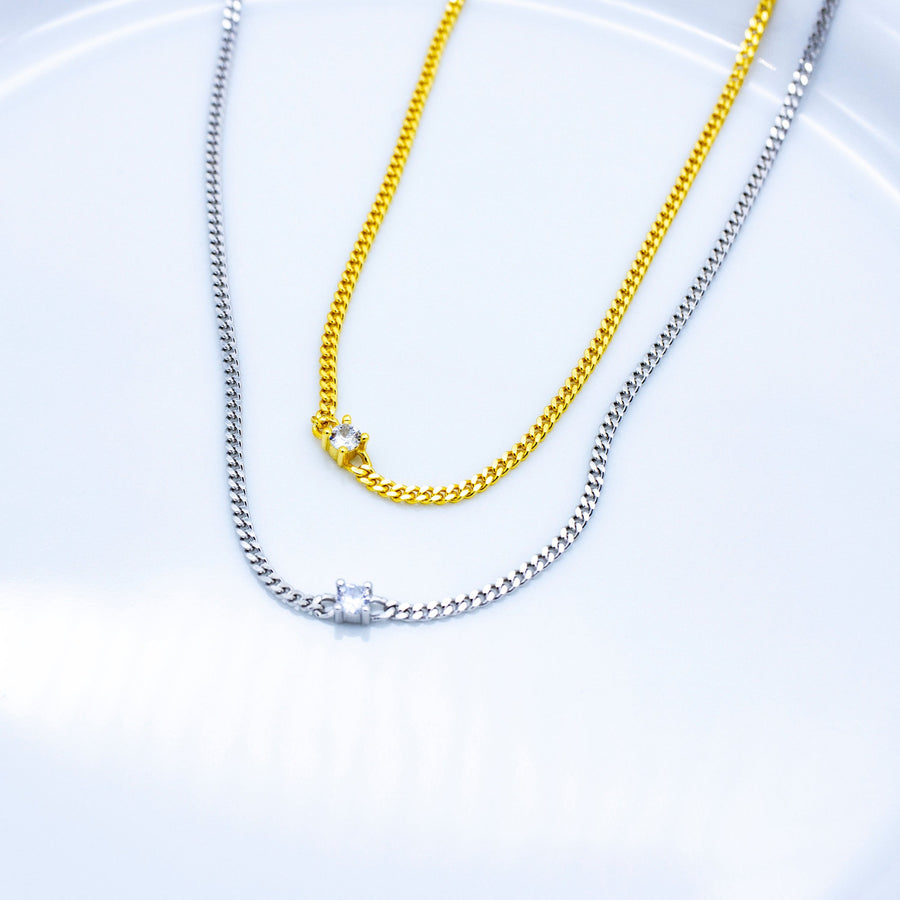 'Munda' gold curb chain with zirconia decorated in sterling silver