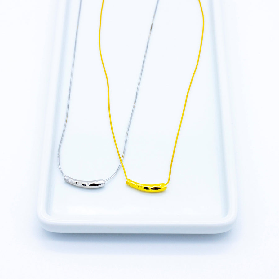 'Gironda' gold necklace with sterling silver tube charm