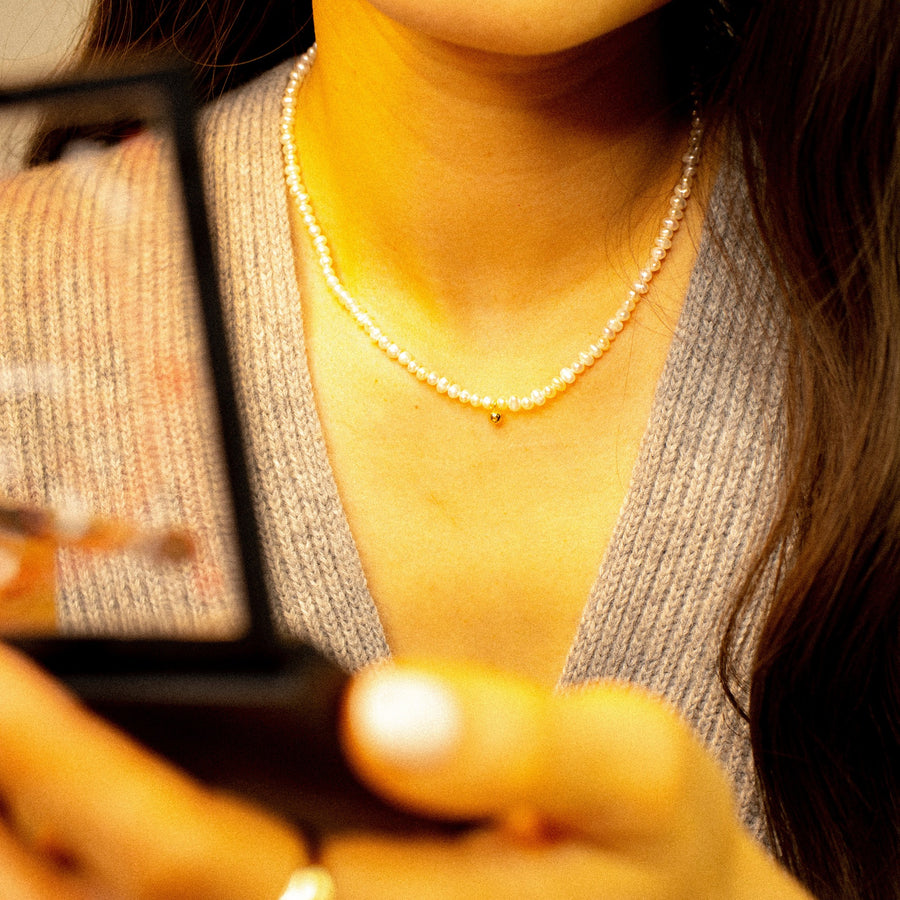 'Elsee' beaded necklace with sterling silver bead pendant