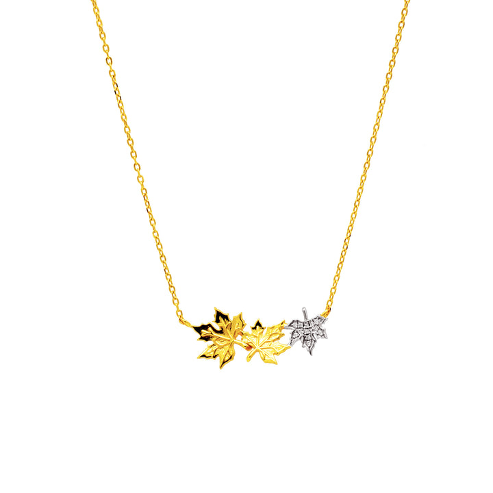 'Luwuk' gold necklace with bicolor maple leaf pendant in sterling silver