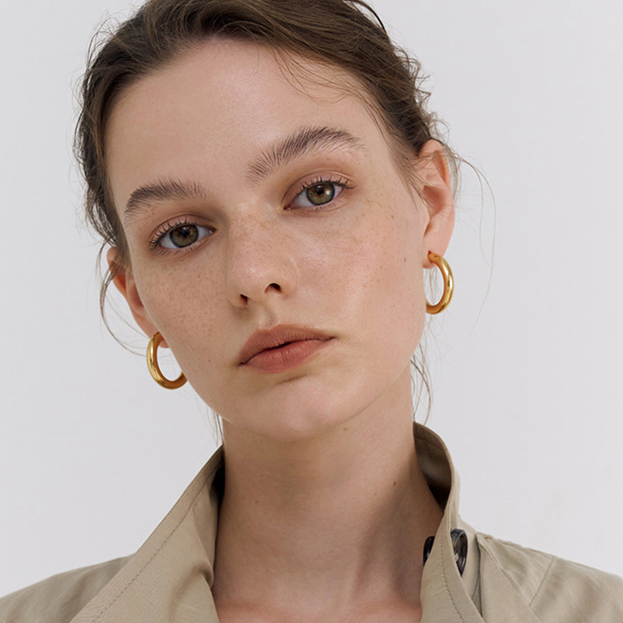 'Neptunus' gold large earrings hoops made of 925 sterling silver